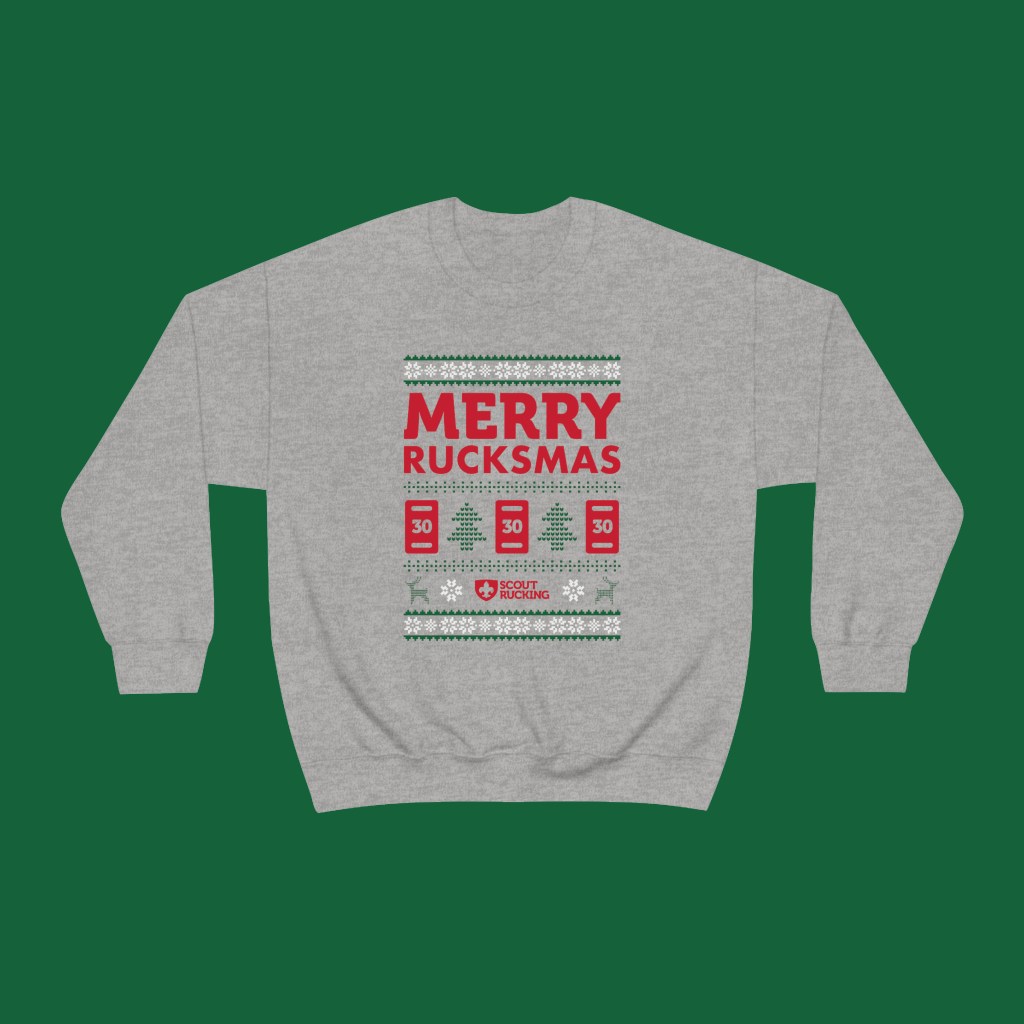 Sweatshirt with an ugly Christmas sweater design, the words, "Merry Rucksmas," and the Scout Rucking logo.